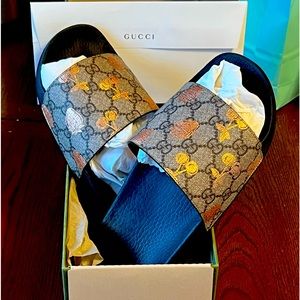 Gucci slides(size40)/monogram crossbody handbag and monogram tote bag.